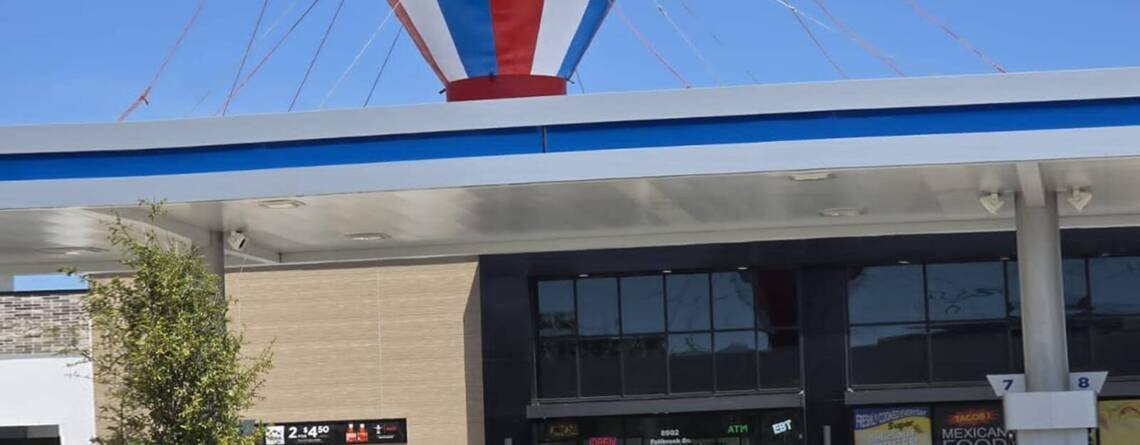 Grab attention with our 22ft Grand Opening Giant Rooftop Balloon